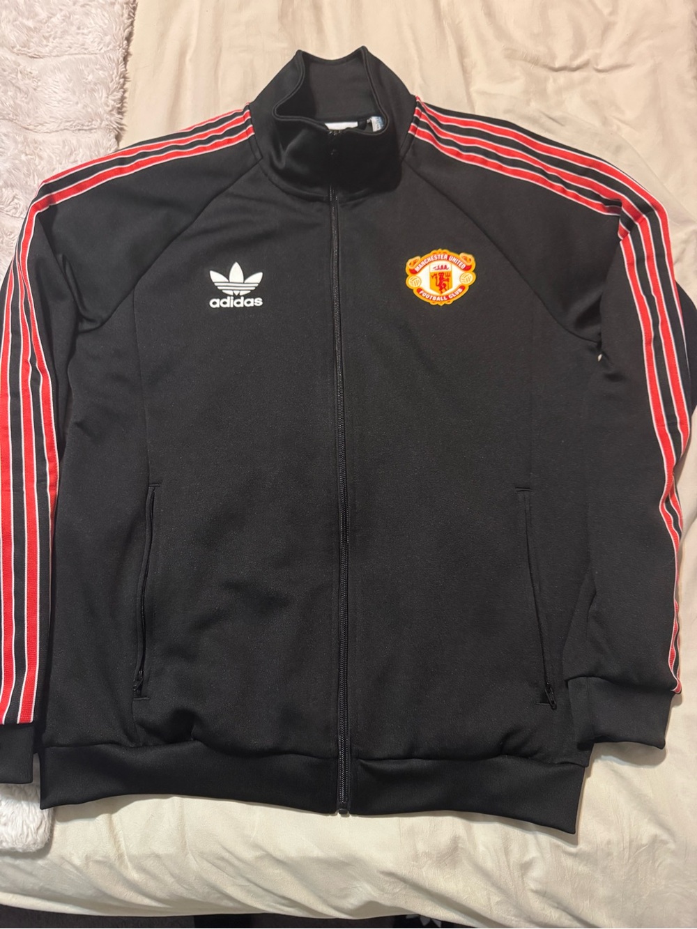 adidas Black Track Jacket with Red Stripe Accents and Manchester United Crest